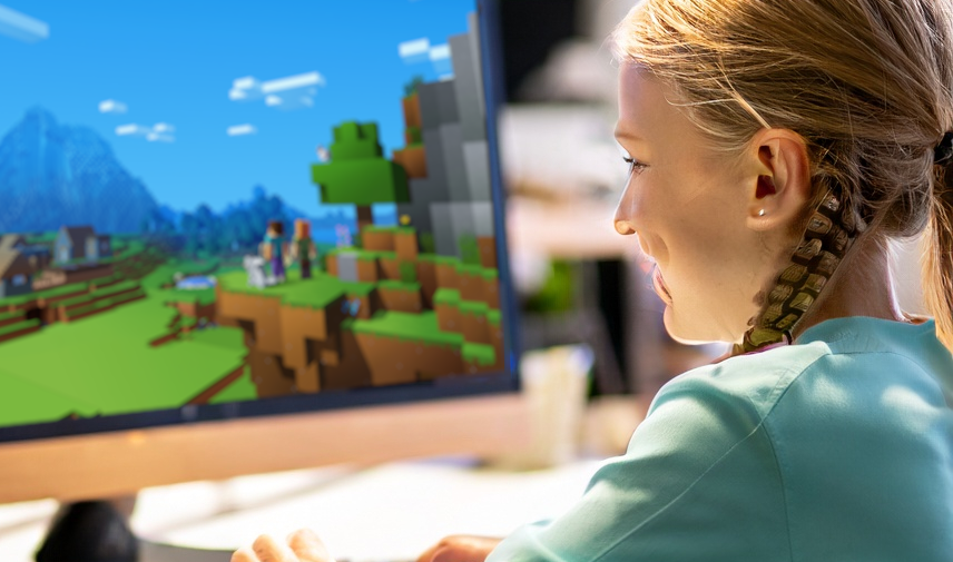 Child playing Minecraft on ENDOS SMP, a kid-friendly Minecraft server